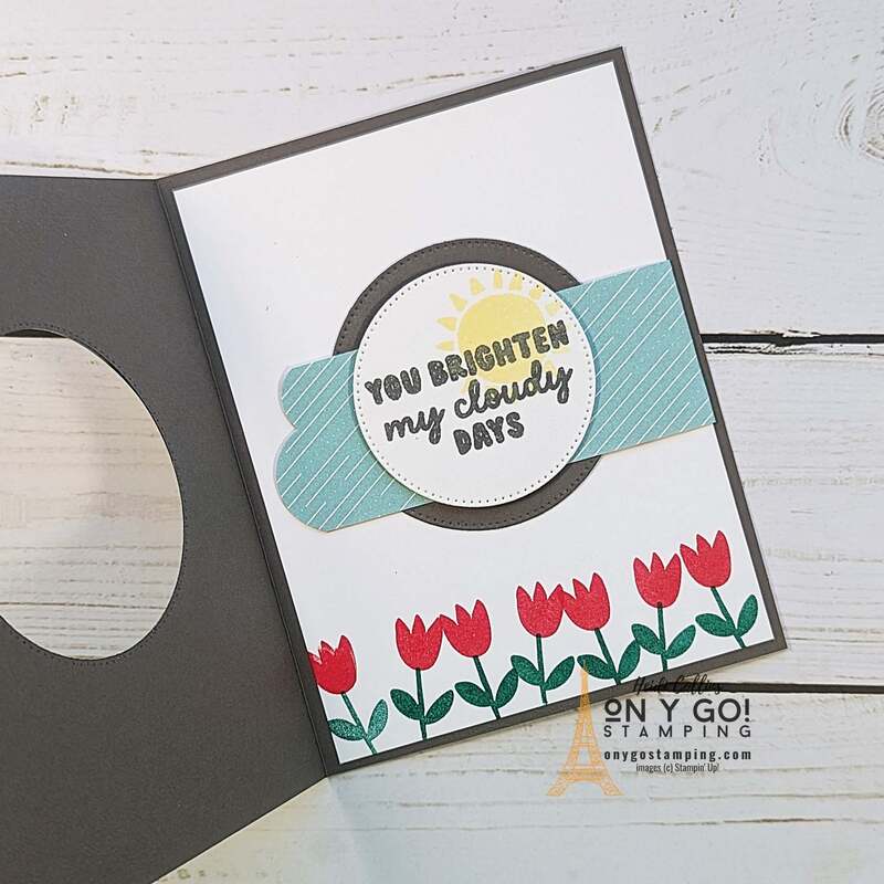 Open up this fun fold card to reveal a field of flowers under the cloudy skies. This window buckle card was made with the Bright Skies stamp set and Sunny Days patterned paper from Stampin' Up!®️ 