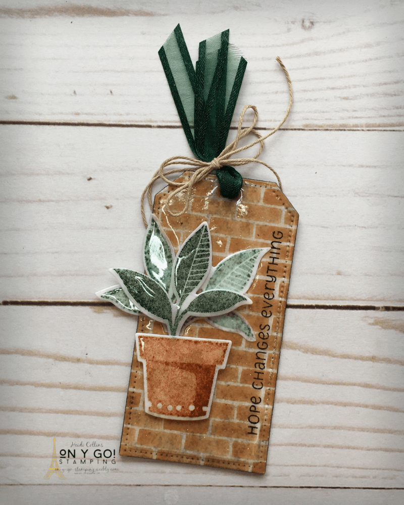 Handmade gift tag using the Plentiful Plants stamp set from Stampin' Up! This gift tag uses a fun rubber stamping technique, multi-dipped embossing, to create a glossy coating making it perfect to repurpose as a magnet or other decor item. 