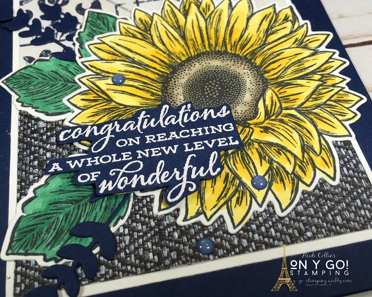 Beautiful handmade card design using the Celebrate Sunflowers stamp set and In Good Taste patterned paper from Stampin' Up! The images are colored with the Stampin' Blends Alcohol markers and the greeting is heat embossed in white.