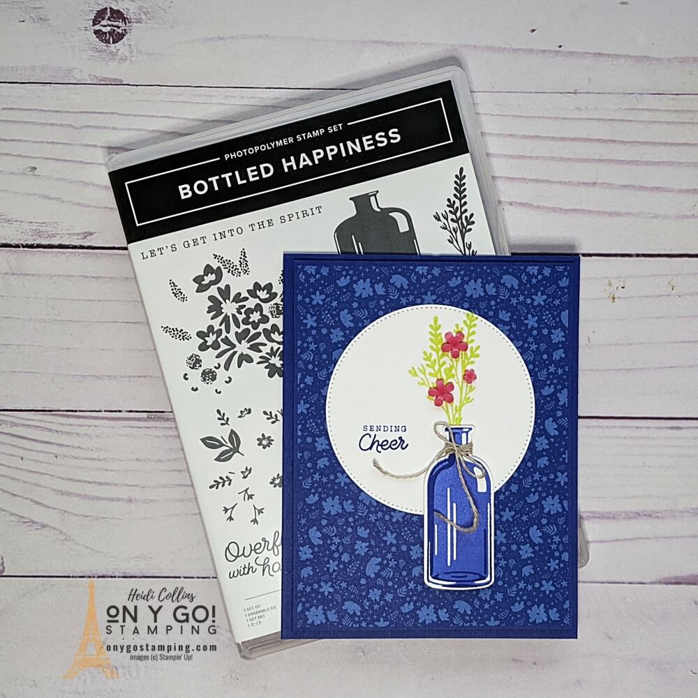 Make a quick floral card with the Bottled Happiness stamp set and Vintage Bottle punch from Stampin' Up!® The floral patterned paper in Starry Sky is the perfect backdrop to this bunch of flowers.