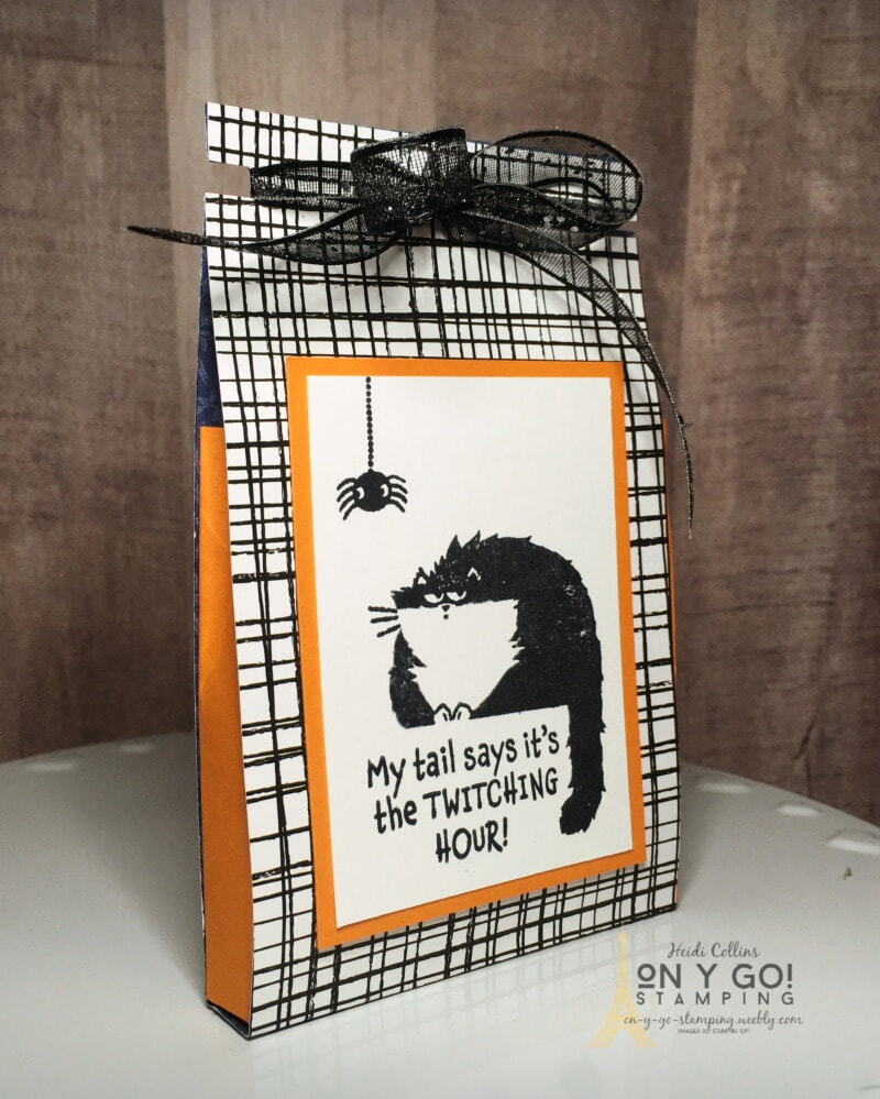 Delight trick-or-treaters with this handmade treat bag for Halloween. Use a little patterned paper to make this treat bag quickly. 