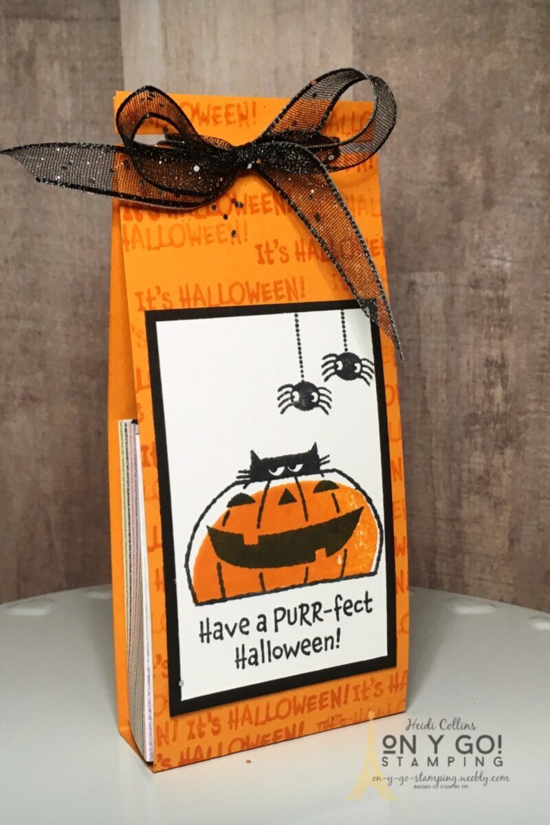 A cute cat peaks out on this easy to make Halloween treat bag. Use the Clever Cats stamp set to create a little treat bag for your favorite trick-or-treaters.