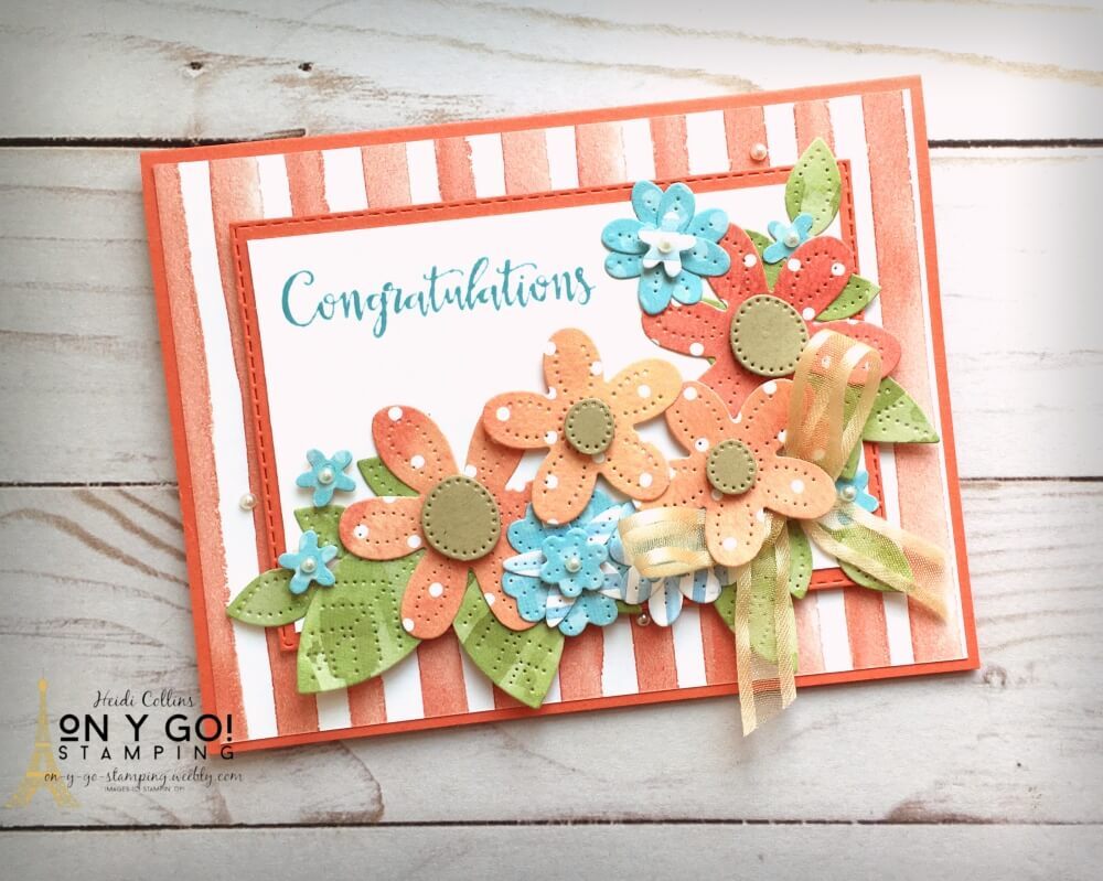 Congratulations card idea that is bursting with flowers! This handmade floral card has flowers cut from the You're a Peach patterned paper with the Pierced Blooms dies from Stampin' Up!