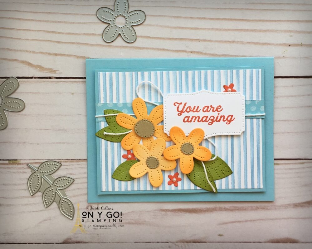 You are amazing and so is this handmade card idea! The beautiful flowers cut with the Pierced Blooms dies pop off the blues of the You're a Peach patterned paper from Stampin' Up!