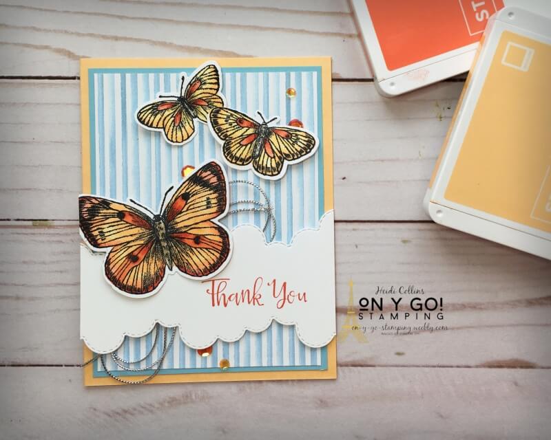 Butterflies are fluttering off the page on this beautiful handmade thank you card. This beautiful summer card uses the Basic Borders dies, Butterfly Brilliance stamps, and You're a Peach patterned paper from Stampin' Up!