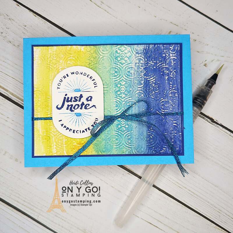 Handmade thank you card using the Filled with Happiness stamp set from Stampin' Up!®️ This card uses the Watercolored embossing card making technique for the background.