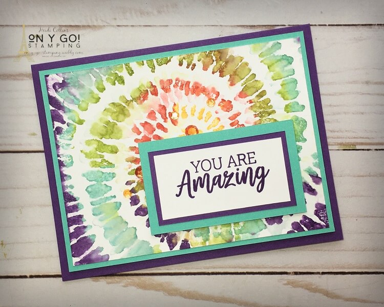 Tie dye card idea using the Spiral Dye and You Are Amazing stamp sets from Stampin' Up! Color directly on the rubber stamp with markers to create this rainbow effect. Such a quick and easy cardmaking technique!