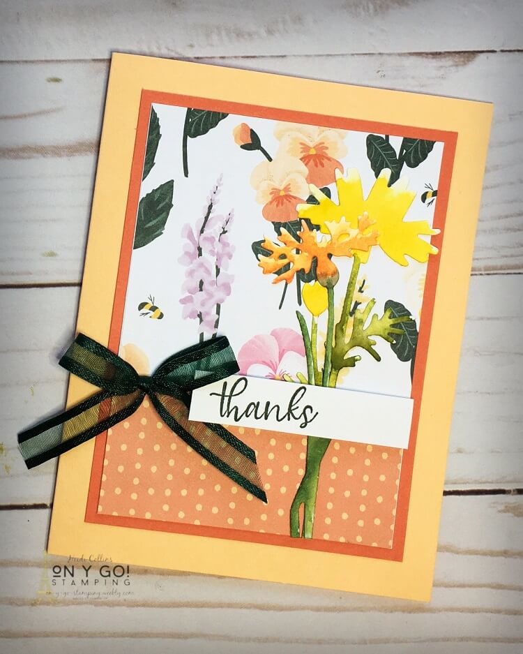 Create a beautiful floral card with a simple card sketch and some patterned paper. These flowers were cut with the Meadow dies and then watercolored.