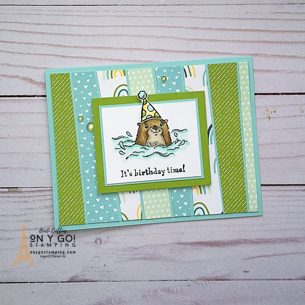 Get the adorable Awesome Otters stamp set and Rainbows & Sunshine patterned paper for FREE during Sale-A-Bration 2022! This card uses the easy scrappy strip card making technique.