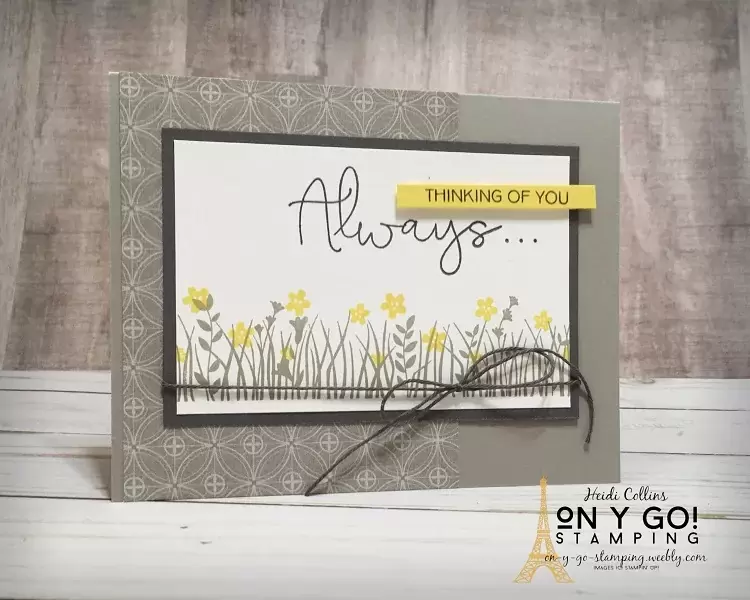 Floral card idea using the Field of Flowers stamp set and Peony Garden patterned paper from Stampin' Up! in soft grays and bright yellow.