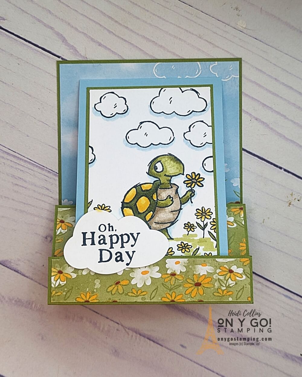 Rain or shine, you can always make a fun and beautiful card with the Playing in the Rain stamp set from Stampin' Up!. This card uses the cheerful Rain or Shine patterned paper to add a sweet touch and will make any recipient smile. With easy folding instructions, anyone can make this card for their special someone for any occasion.