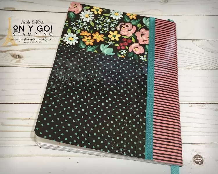 The backside of a composition notebook journal covered with the Flowers and Field patterned paper from Stampin' Up! This paper will be FREE during Sale-A-Bration in January and February.