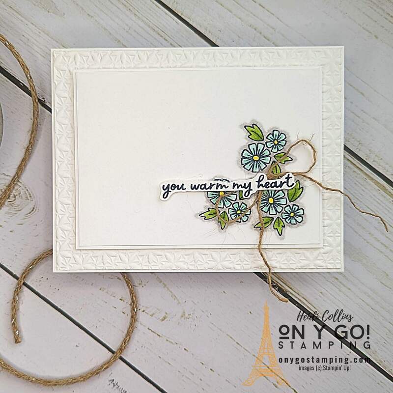 Easy handmade floral card using the Warmest Heart stamp set from Stampin' Up! Simple flowers on a white background make for an easy, but elegant handmade card.